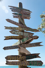 Distance signpost with blue sky in the background. Key West, Florida