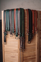  Lots of handmade belts on the counter