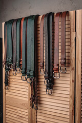  Lots of handmade belts on the counter