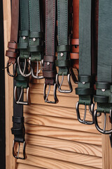  Lots of handmade belts on the counter