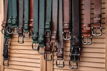  Lots of handmade belts on the counter