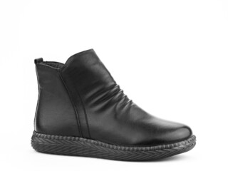 Women's autumn black leather jodhpur boots with black sole isolated on white background. Right side view. Fashion shoes. Photoshoot for shoe shop concept.