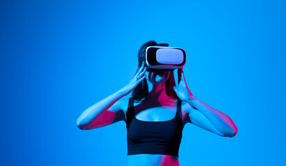 Smile happy woman getting experience using vr-headset glasses of virtual reality much gesticulating...