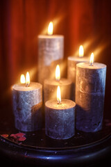 Obraz na płótnie Canvas Set of burning candles on the table