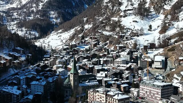 Aerial View on Zermatt Valley and Matterhorn Peak in the Morning sunlight in Switzerland