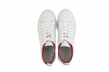 White leather sneakers. Casual women's style. White lacing and white rubber soles. Isolated...