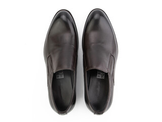 A pair of classic leather elegant men's shoes isolated white background. Groom's stylish black shoes. Isolated object close up on white background.