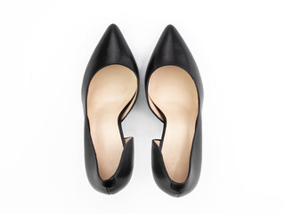Classic and elegant high-heeled women shoes. Stylish black shoes on high thin heels and with a...