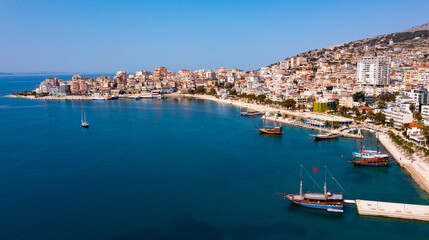 Fototapeta na wymiar Aerial view of the resort town of Saranda, located on the coast of the Ionian Sea, Albania