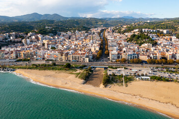 View over the town, the beach and the fishing harbor of Arenys de Mar. on the mediterranean coast...