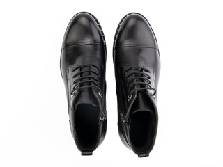 A pair of classic leather elegant men's shoes isolated white background. Groom's stylish black shoes. Isolated object close up on white background.