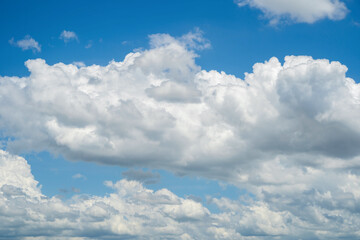 Naklejka na ściany i meble Blue sky backgroud with white clouds.