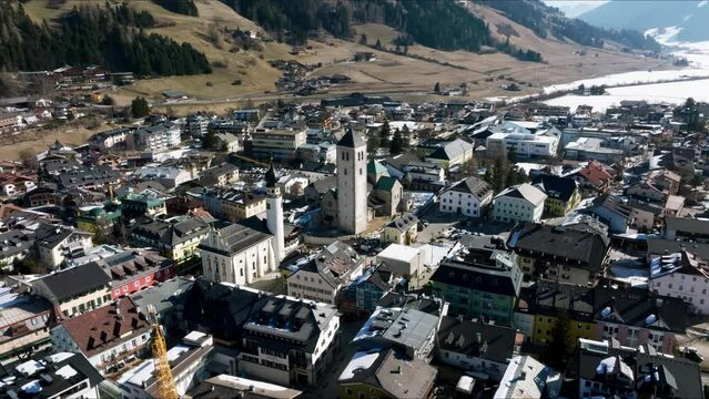 Aerial view of the Alpine town of San Candido in Italy. Small ski resort winter town.