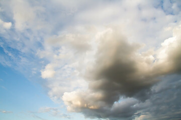 Cumulus clouds. White clouds on a blue background.