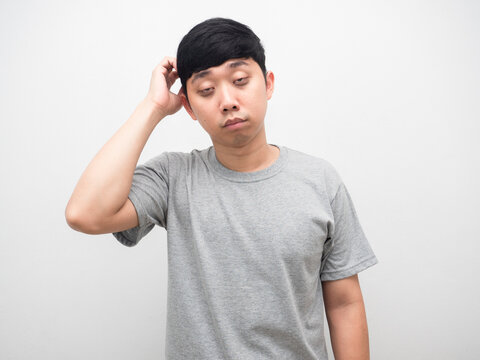 Man sleepless dark circle under his eyes gesture scratch head