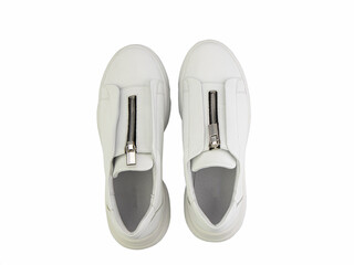 White leather sneakers with zipper in front instead of laces on white background. Casual women's style.Top view. Fashion shoes