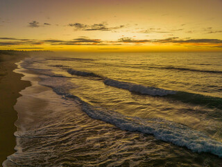 Aerial sunrise seascape with  high cloud