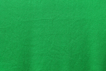 Green color fabric cloth polyester texture and textile background.