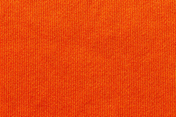 Orange color fabric cloth polyester texture and textile background.