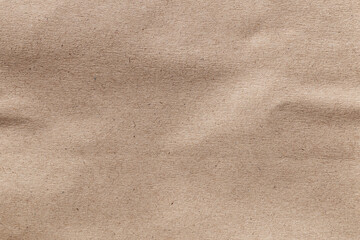 Brown eco recycled kraft paper sheet texture cardboard background.