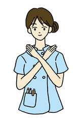 ノーのポーズをする女性看護師