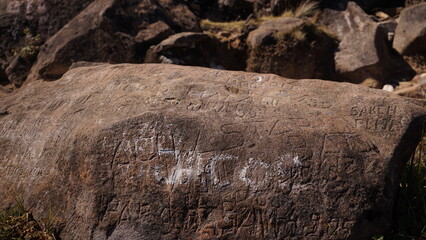 Vandalism at the top of Mount Arjuno. the stones are painted by anonymous. Mount Arjuno is next to Mount Welirang, located in Malang, East Java, Indonesia.