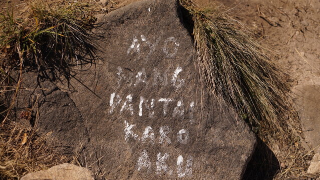 Vandalism at the top of Mount Arjuno. the stones are painted by anonymous. Mount Arjuno is next to Mount Welirang, located in Malang, East Java, Indonesia.