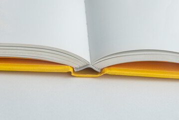 Physical paper book over background - closeup