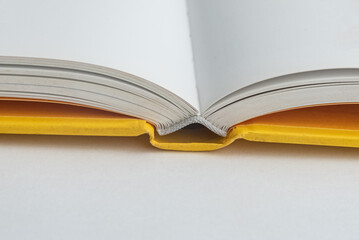 Physical paper book over background - closeup