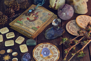 Wicca, esoteric and occult still life with vintage magic objects and old tarot cards on witch table altar for mystic rituals and fortune telling. Halloween and gothic concept