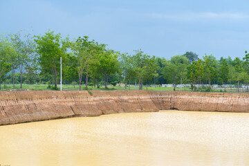 Water reservoir for irrigation in agriculture. Pond for aggregate agriculture.
