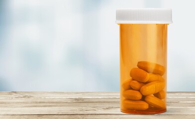 Medical vial with pills without text. Plastic Prescription.