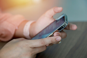 Close up women using mobile smartphone