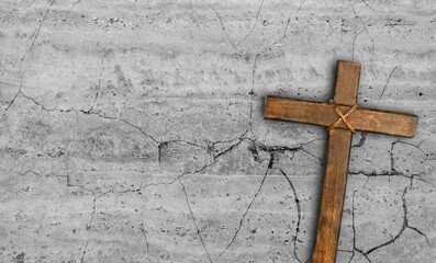 Wooden cross on a background. Christian religion.