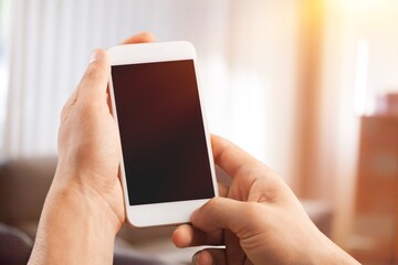 Mobile Mockup. Unrecognizable person Holding Blank Smartphone With Screen