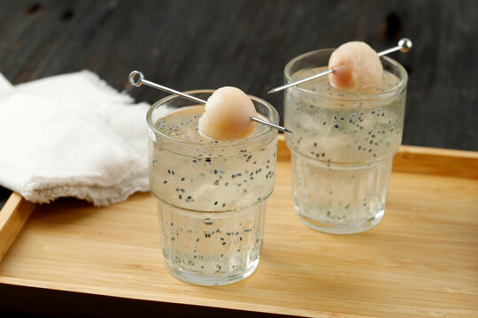 Bird Nest Ice or Es Sarang Burung, Indonesian Traditional Refreshment Made from Shredded Jelly, Basil Seed, Lyche, Simple Syrup, and Nata de Coco.