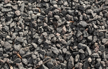 Small pebbles of crushed stone as an abstract background.