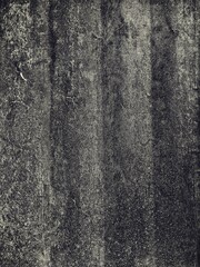 Paint texture peeling off concrete wall.Distressed crackled antique paint texture in black and white.Grunge wall texture background.Grunge wall texture background. Paint cracking off dark.