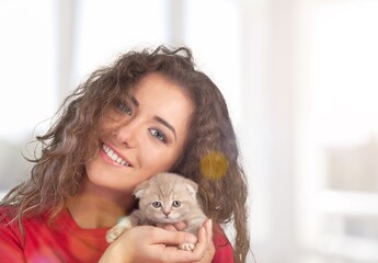 Young woman resting with pet at home. Morning sleep time at home.