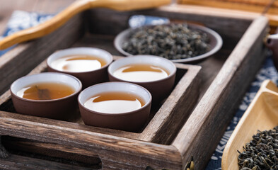 Obraz na płótnie Canvas chinese tea set on bamboo mat