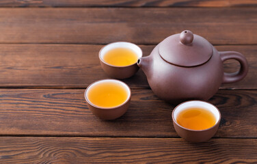 Fototapeta na wymiar chinese tea set on bamboo mat