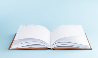 Notepad over blue background