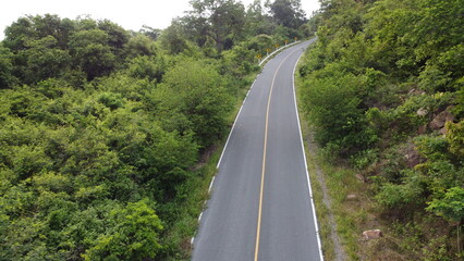  top view of  road aerial view  tropical mountains landscape.