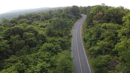  top view of  road aerial view  tropical mountains landscape.