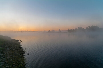 Fog over the river at dawn.