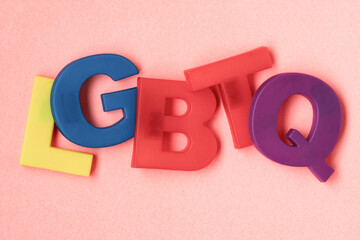 LGBTQ word made from colourful plastic fridge magnets