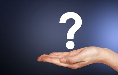 businessman hand holding question mark. concept of Question mark and FAQs, Ask quiestion online