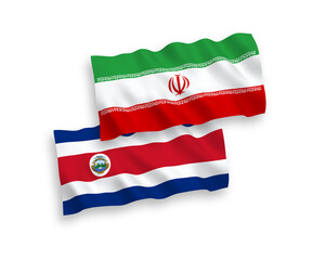 National vector fabric wave flags of Republic of Costa Rica and Iran isolated on white background. 1 to 2 proportion.