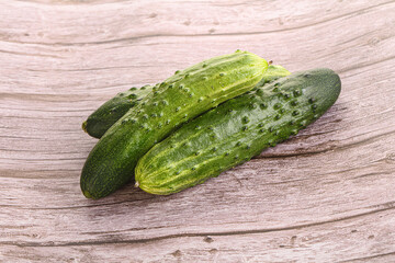 Fersh juicy green cucumbers heap