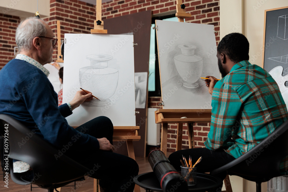 Aufkleber multiethnic students sketching vase model on painting canvas using graphic pencil working at drawing
